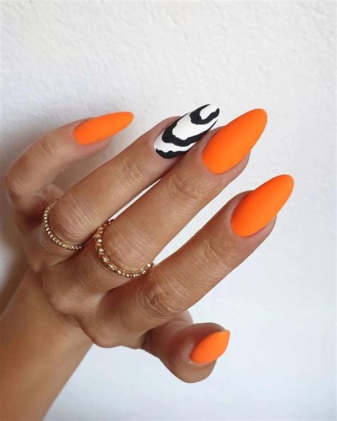 black nails orange tips|light orange nail designs.